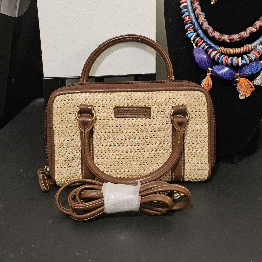 Woven hand held / crossbody wallet purse by Connections